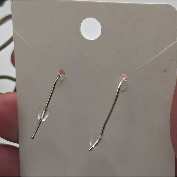 "5/$25" Pair of Silvertone Mismatched Cross Dangle Earrings - Picture 2 of 6